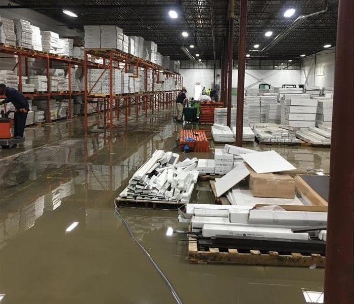 Warehouse with water on ground in Solon